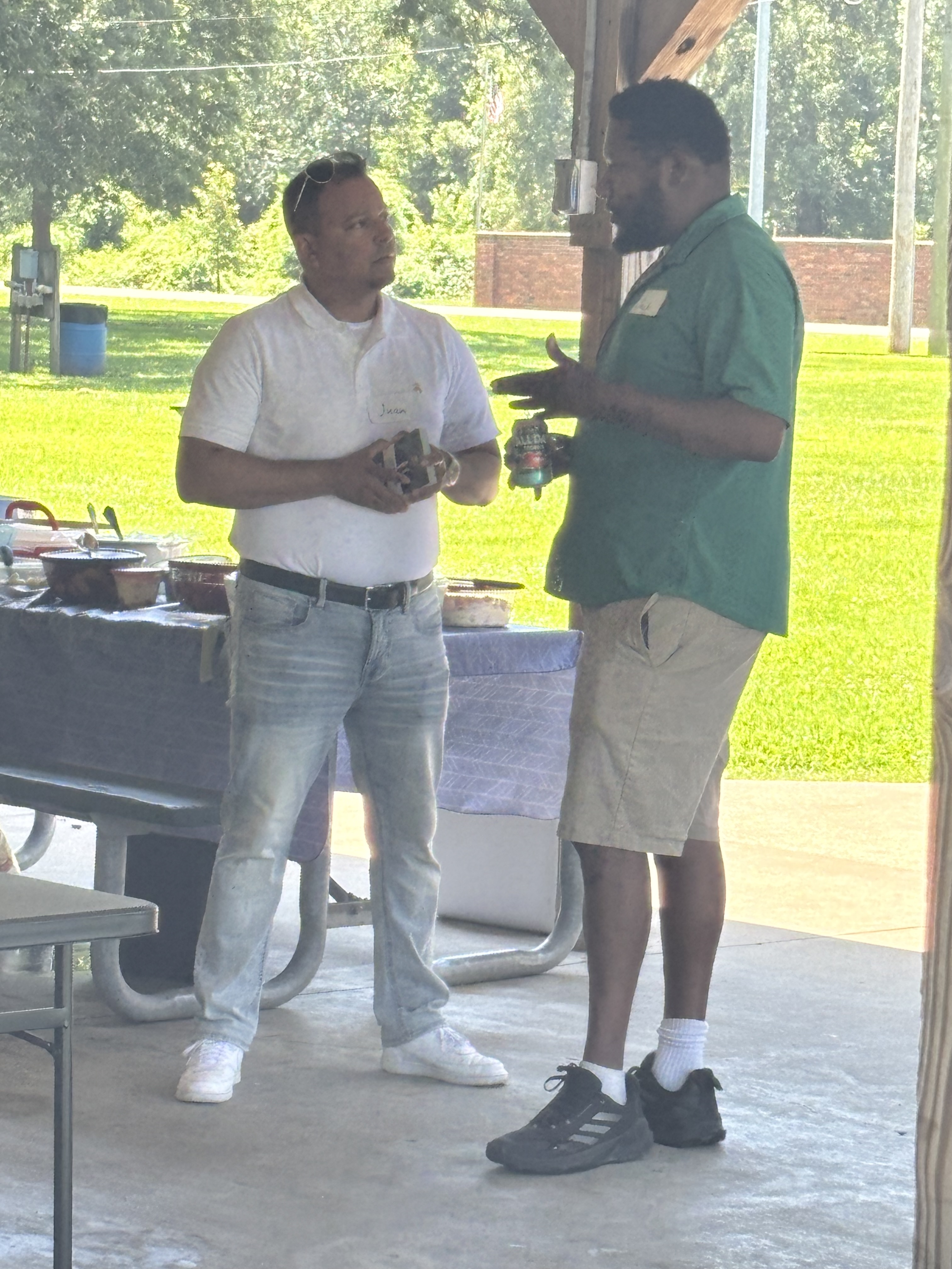 Juan speaking to a constituent about Crawford