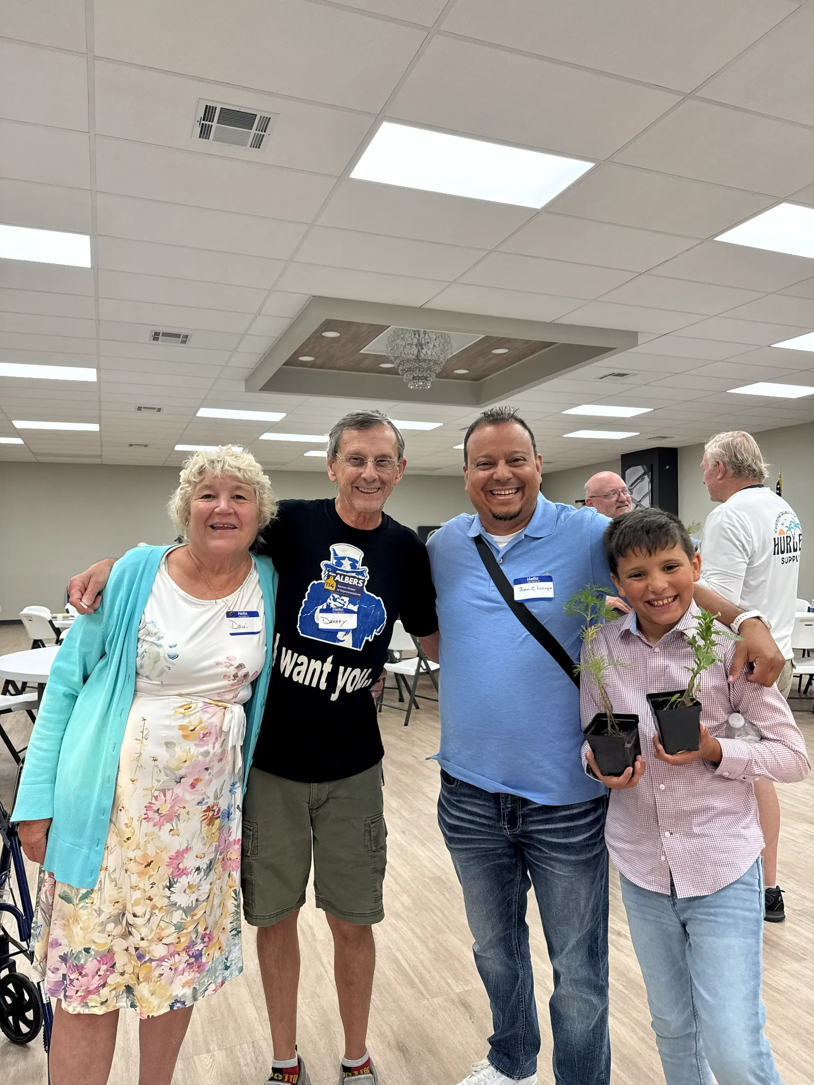 Juan C. Luengo with supporters at a community event in Kingman County.